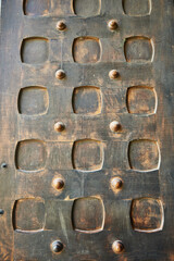 Texture of old wooden door close up