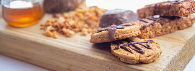 chocolate chip cookies, granola bars and cereal bars - light breakfast - healthy food concept