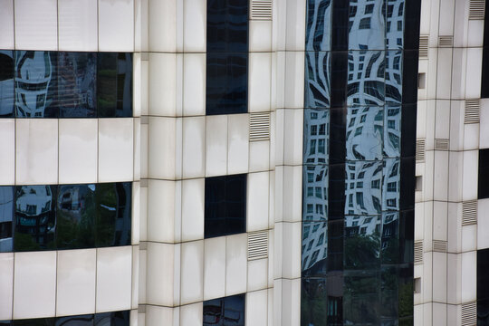 small offices and windows in a large skyscraper