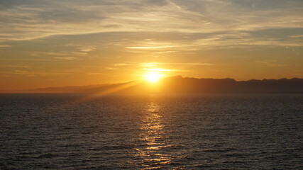 Fototapeta na wymiar dramatic sunset over the sea