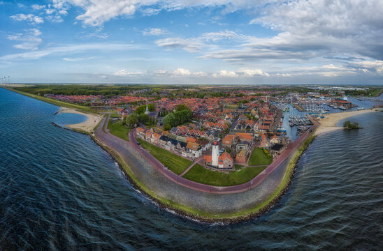 Panorama-aerial view of Urk with its lighthouse, a small coastal village on the IJsselmeer in the Netherlands..