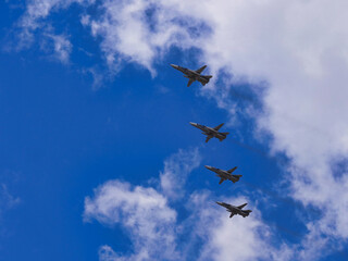 Fighter jets fly at ultra-low altitude over the city