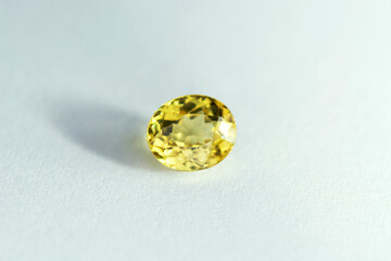 Genuine natural unheated lemon greenish yellow color clean mali garnet loose faceted gemstone. Small rare gem for making designed jewelry. Light blue gradient backgound. 
