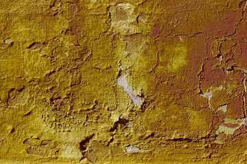 Texture of the lemon yellow stucco wall with scratches, cracks, dust, crevices, roughness. Can be used as a poster or background for design.