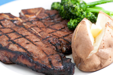 t-bone steak and baked potato