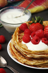 Russian cuisine national dish bliny with fresh berries