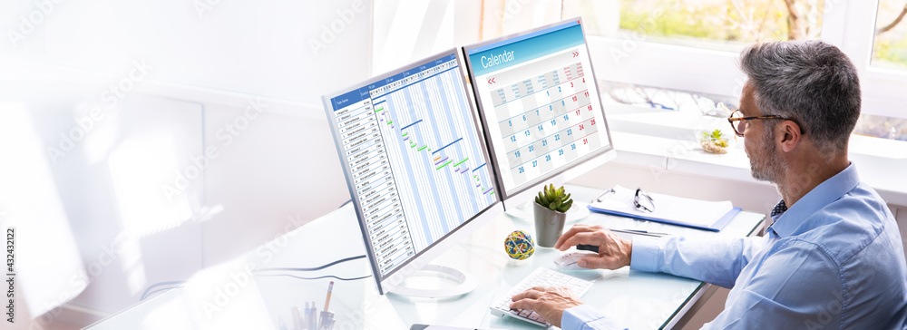 Poster Businessman Checking Calendar On Computer Screen