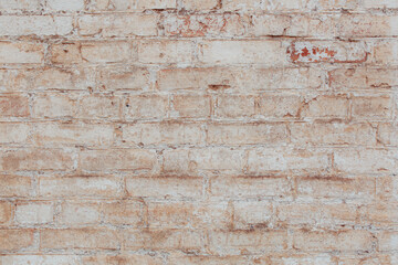 Old grungy brick wall with natural defects. Scratches, cracks, crevices, chips, dust, roughness. Can be used as background for design or poster.