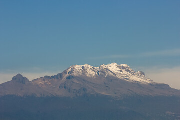 Top of Iztaccihuatl volcano covered with snow