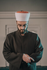 Muslim man praying in mosque