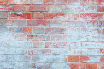 Texture of an old brick wall with natural defects. Scratches, cracks, crevices, chips, dust, roughness, grungy. Can be used as background for design or poster.