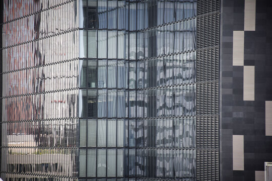 small offices and windows in a large skyscraper