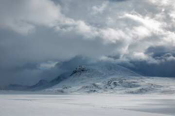 Snowshoeing Kungsleden trail from Abisko to Nikkaluokta in early April, Lapland, Sweden