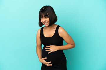 Obraz premium Woman over isolated background pregnant