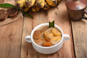 Kolak is an Indonesian dessert based on banana, sweet potato,palm sugar or coconut sugar,coconut milk, and pandanus leaf