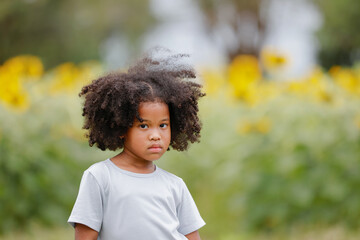 childhood and back emotion concept- little african american curly hair girl