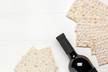 Flat lay composition with matzos on color background. Top view. Passover (Pesach) festive