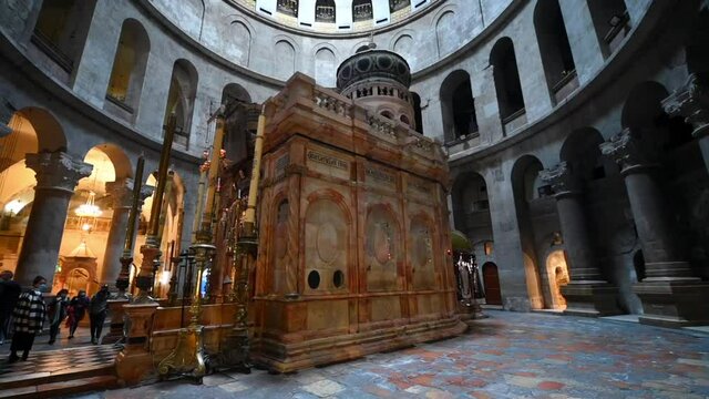 Panning Shot Of Tourists Visiting Shrine At Church Of The Holy Sepulcher - Jerusalem, Israel