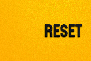 Reset - words on yellow background