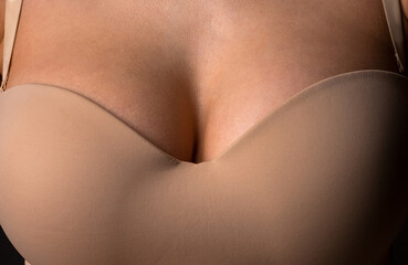 Women with large breasts. Sexy breas, boobs in bra, sensual tits. Beautiful slim female body. Lingerie model. Close up of sexy female boob in bra.