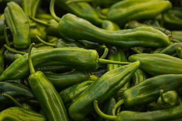 Close-up green vegetable for background, green pepper texture. Green peppers form a natural shape. Fresh raw vegetables