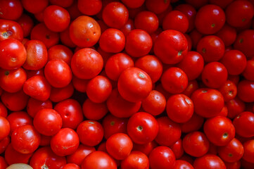 Delicious red tomatoes. Summer tray market agriculture farm full of organic vegetables It can be used as background