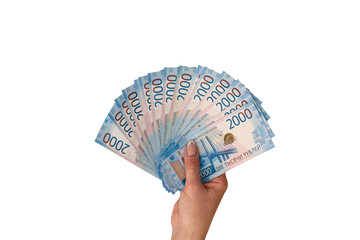 Woman hand with two thousandth russian ruble bills fan
