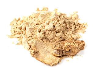 handful of dried ginger roots and powder on white