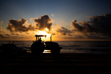 Trator na praia 