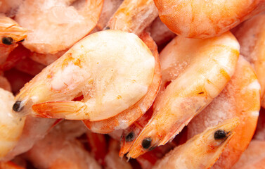 Frozen red shrimps as background.