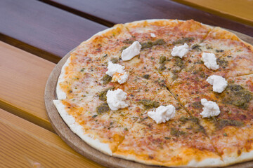 Fresh Italian pizza out of the oven