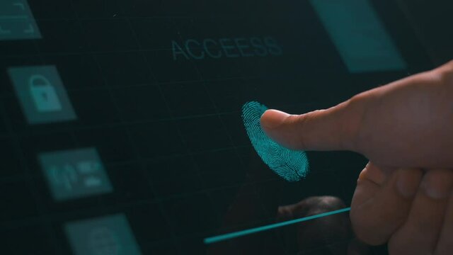 Close up human is touching interface computer monitor, fingerprint biometric identity and approval. future security and password control through fingerprints technology and cybernetic, business