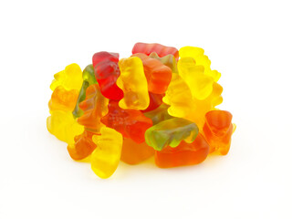Heap of colorful gummy bears candies isolated on white background