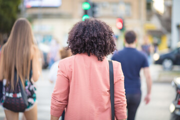 Business woman walking on the street.