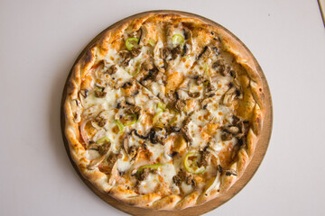Fresh Italian pizza out of the oven