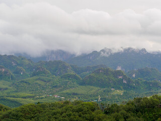 Beautiful panoramic hills and mountains scenery with morning atmosphere during rainy season at Doi Tapang, Sawi District, Chumphon, Thailand.