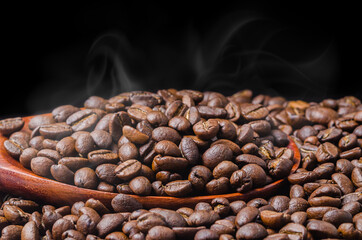 Coffee beans fresh roast with smoke.