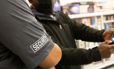 Security guard recording information to share