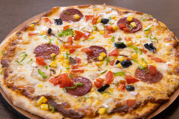 Fresh Italian pizza out of the oven