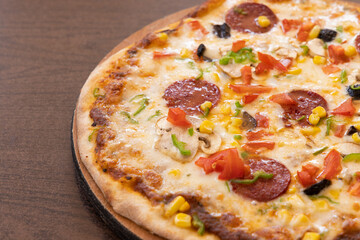 Fresh Italian pizza out of the oven