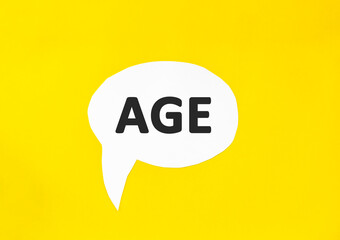 Text AGE speech bubble isolated on the yellow background. Business concept.