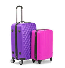 Packed stylish suitcases on white background. Traveler's luggage