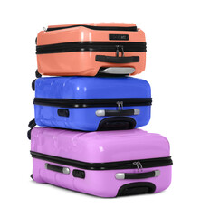 Stylish suitcases packed for travel on white background