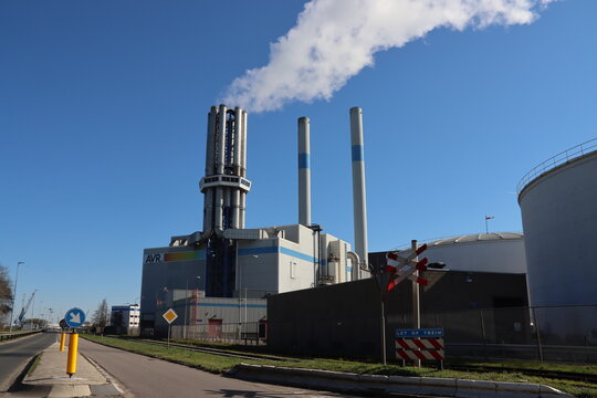 Steam from the chimneys of waste incinerator AVR in the Botlek harbor in the port of Rotterdam