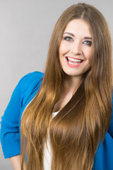 Fototapeta premium Portrait of beautiful cheerful young woman