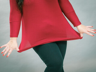 Woman plus size in red tunic