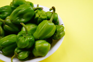 Obraz na płótnie Canvas capsicum , varieties , Green chili , Is capsicum a fruit ,capsicum is a fruit or vegetable .