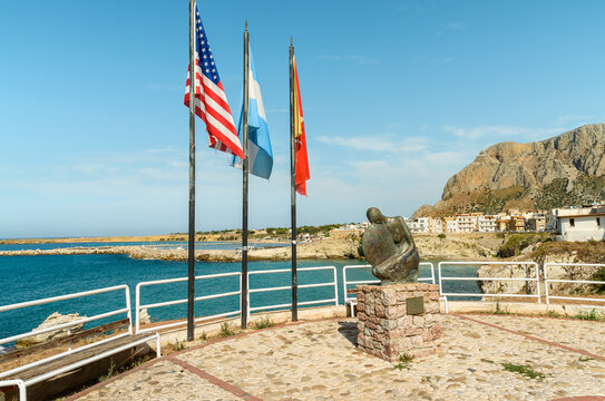 Waterfront promenade of Terrasini with monument to emigrants, province of Palermo, Sicily, Italy