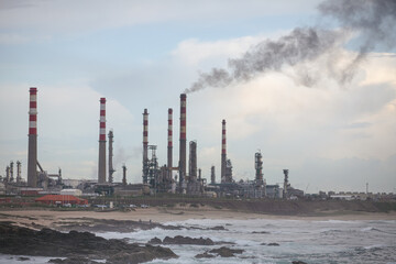 Fototapeta na wymiar Oil refinery by the sea