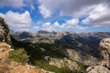 Fototapeta na wymiar Panoramic view from Puig d'Alaro on the Serra de Tramuntana, island of Majorca, with blue sky